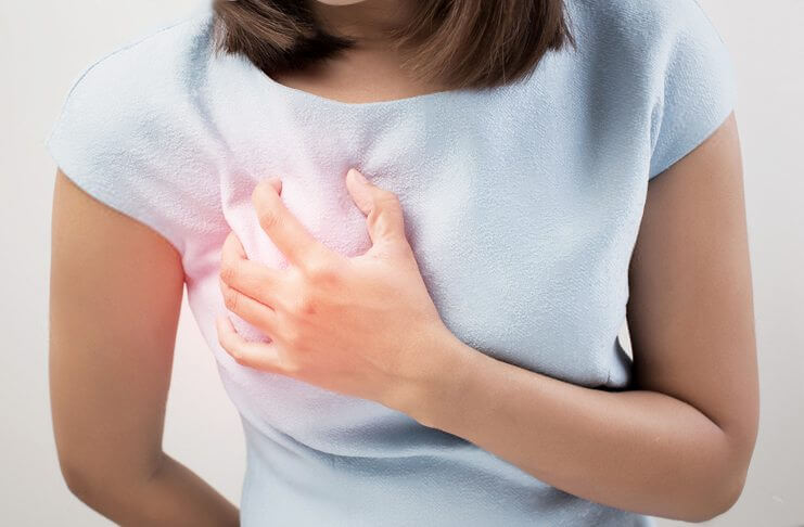 Біль в молочних залозах: симптоми, причини виникнення